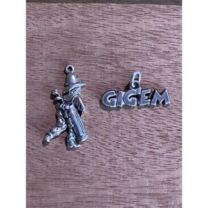 1 Fishing "GIG'EM" & 1 Golfer Sterling Silver bracelet charms